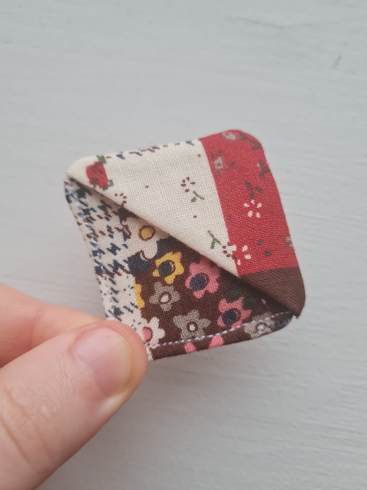 Hand sewn bookmark - corner