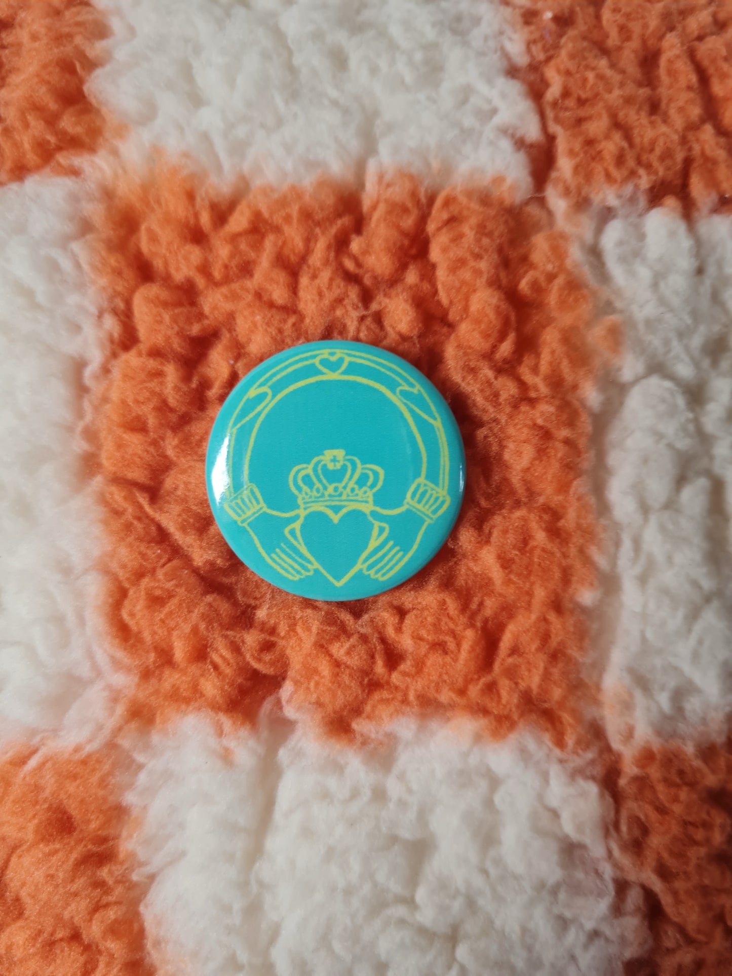 Teal claddagh badge pin