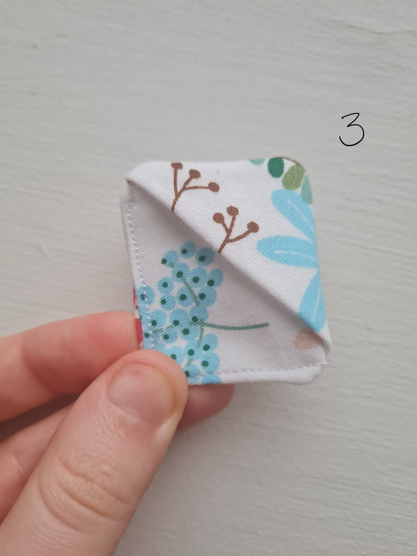 Hand sewn bookmark - corner
