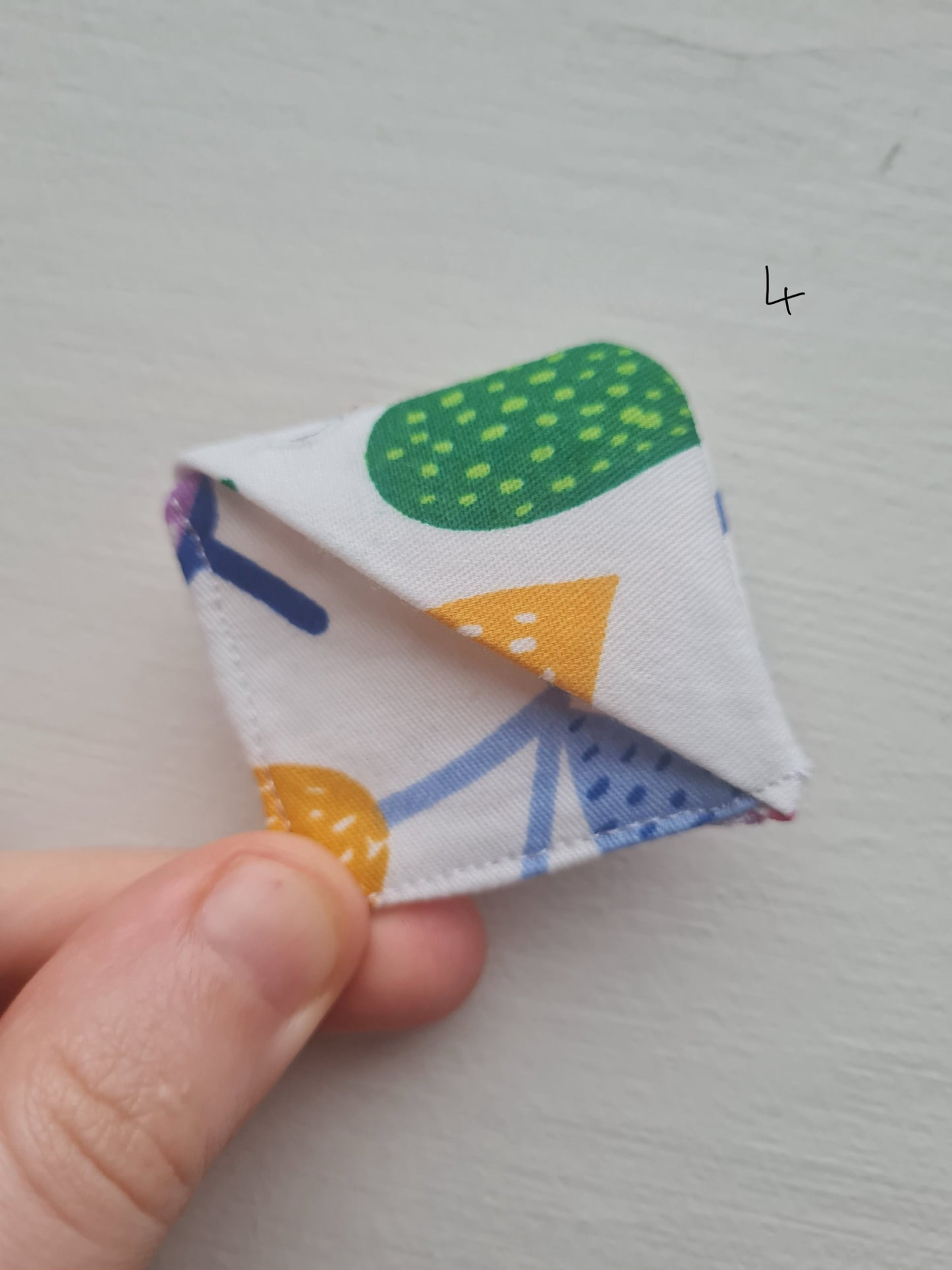 Hand sewn bookmark - corner