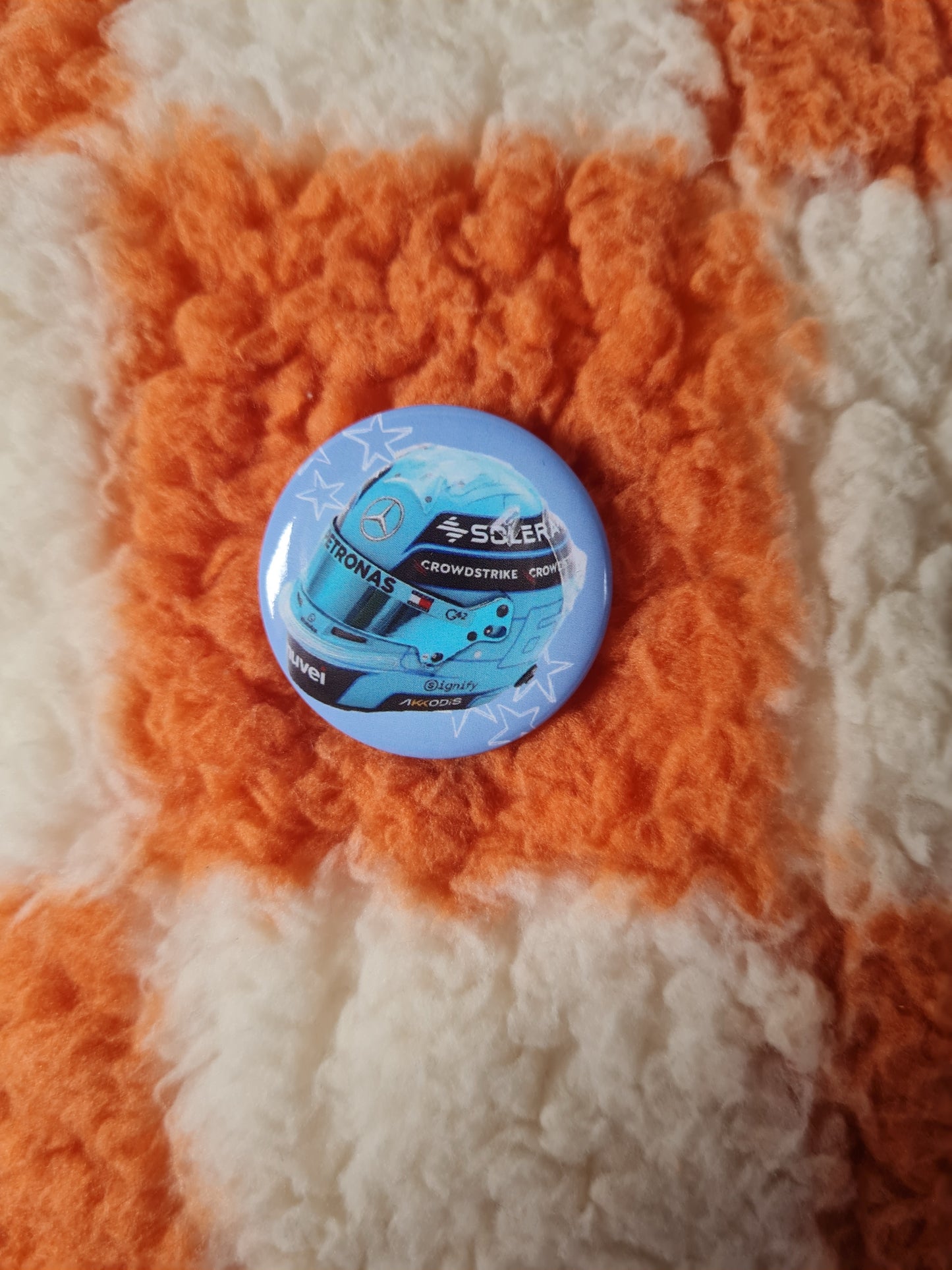 George Russell helmet badge pin